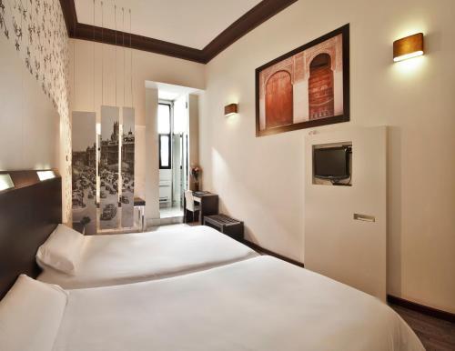 Foto de una habitación de Alhambra Suites