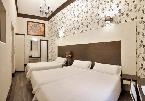 Foto de una habitación de Alhambra Suites