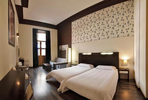 Foto de una habitación de Alhambra Suites