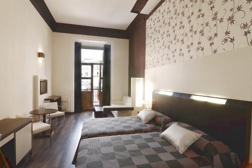 Foto de una habitación de Alhambra Suites