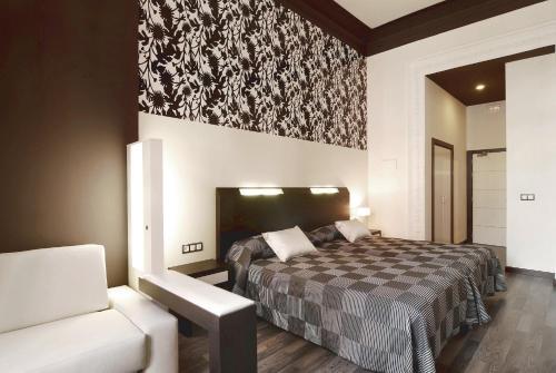 Foto de una habitación de Alhambra Suites