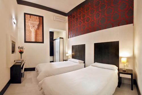 Foto de una habitación de Alhambra Suites