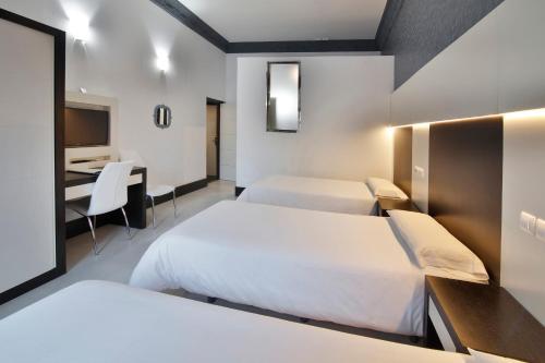 Foto de una habitación de Alhambra Suites