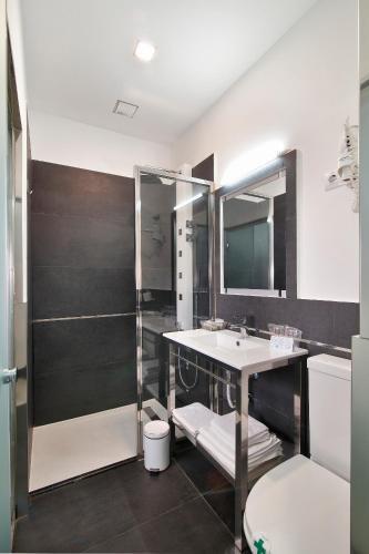 Foto del baño de Alhambra Suites