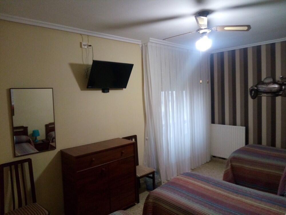 Foto de una habitación de Pensión Cinco Villas