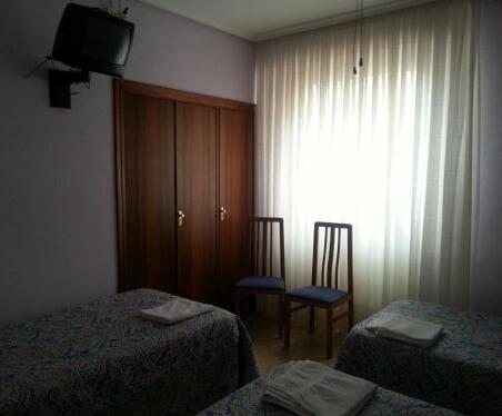 Foto de una habitación de Pensión Cinco Villas