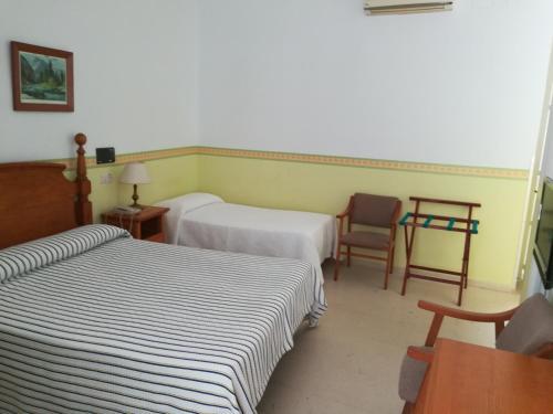 Foto de una habitación de Nuevo Hotel