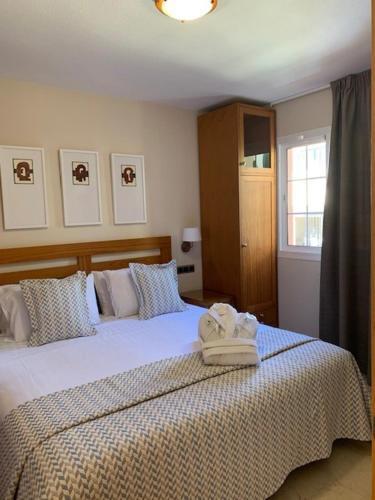 Foto de una habitación de Apartamentos Macdonald Doña Lola Resort