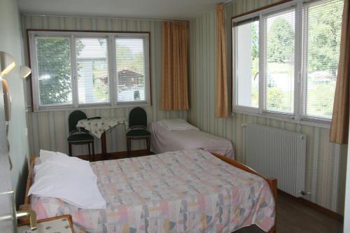Foto de una habitación de Hotel Bon-Séjour