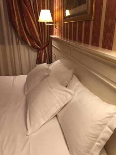 Foto de una habitación de Noventa Hotel