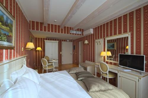 Foto de una habitación de Noventa Hotel
