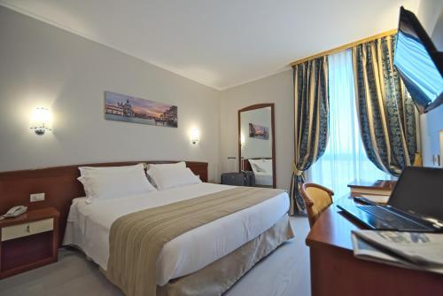 Foto de una habitación de Noventa Hotel