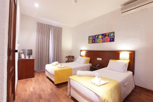 Foto de una habitación de Hotel Residencial Mar e Sol
