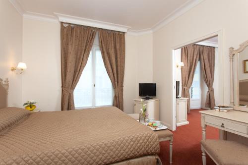 Foto de una habitación de Grand Hôtel Moderne