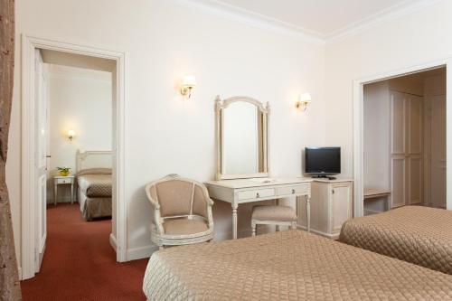 Foto de una habitación de Grand Hôtel Moderne
