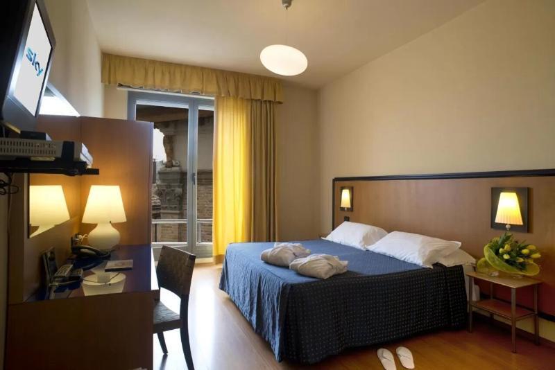 Foto de una habitación de Hotel Masini