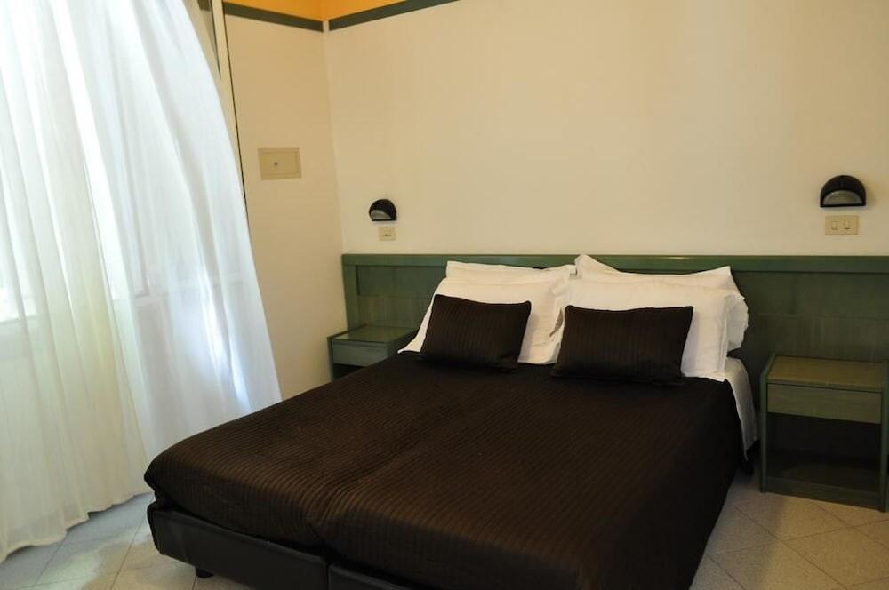 Foto di una camera da Esedra Hotel