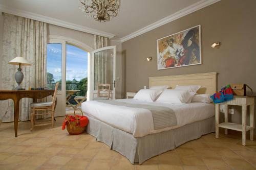 Foto de una habitación de Hotel Le Mas Des Sables