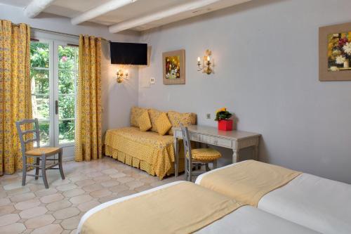 Foto de una habitación de Hotel Le Mas Des Sables
