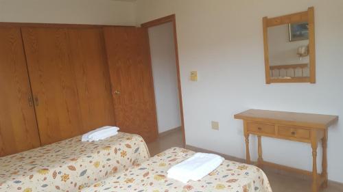 Foto de una habitación de Apartamentos Mar Bella