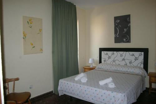 Foto de una habitación de Apartamentos Torre Don Vicente - Arca Rent