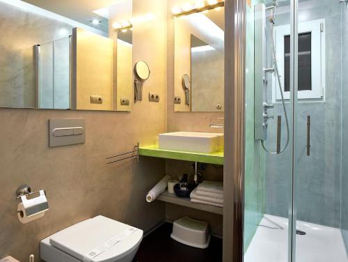 Foto del baño de Alquileres Vacacionales Gaudint Barcelona Suites