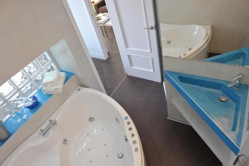 Foto del baño de Alquileres Vacacionales Gaudint Barcelona Suites