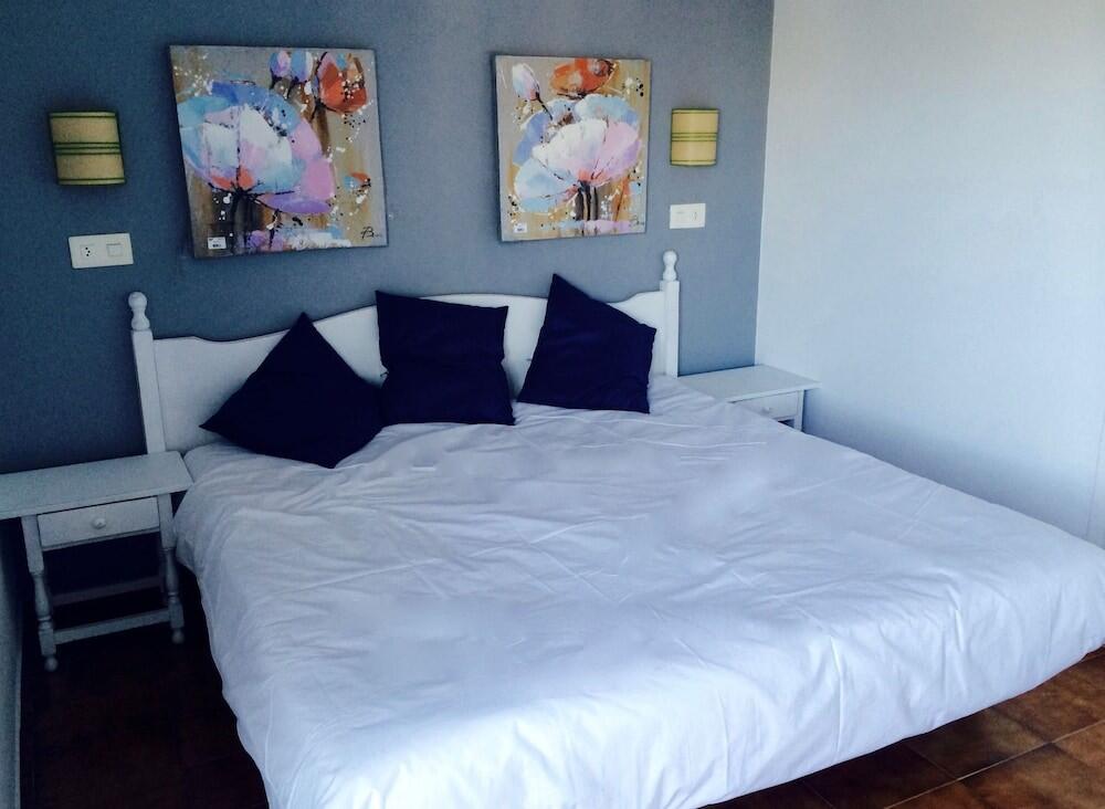 Foto de una habitación de Apartamentos Encanto Del Mar