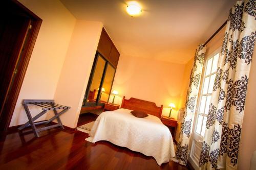 Foto de una habitación de Hotel Rural A Quinta