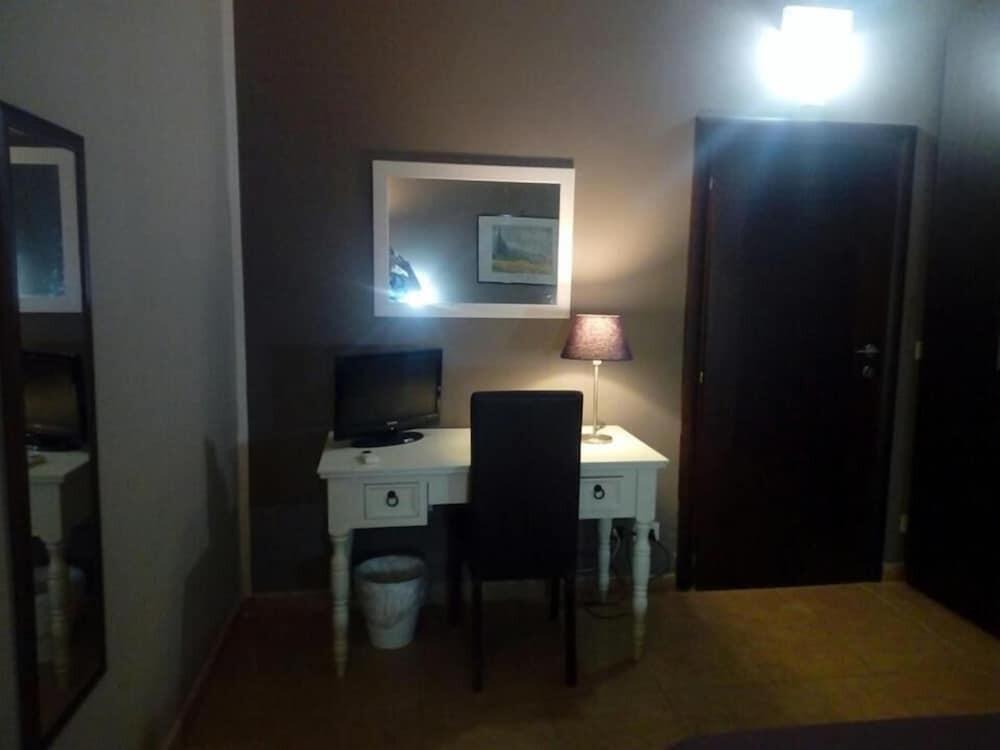 Foto de una habitación de Hotel Residence La Palma
