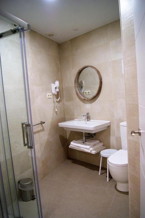 Foto del baño de Hotel La Encomienda
