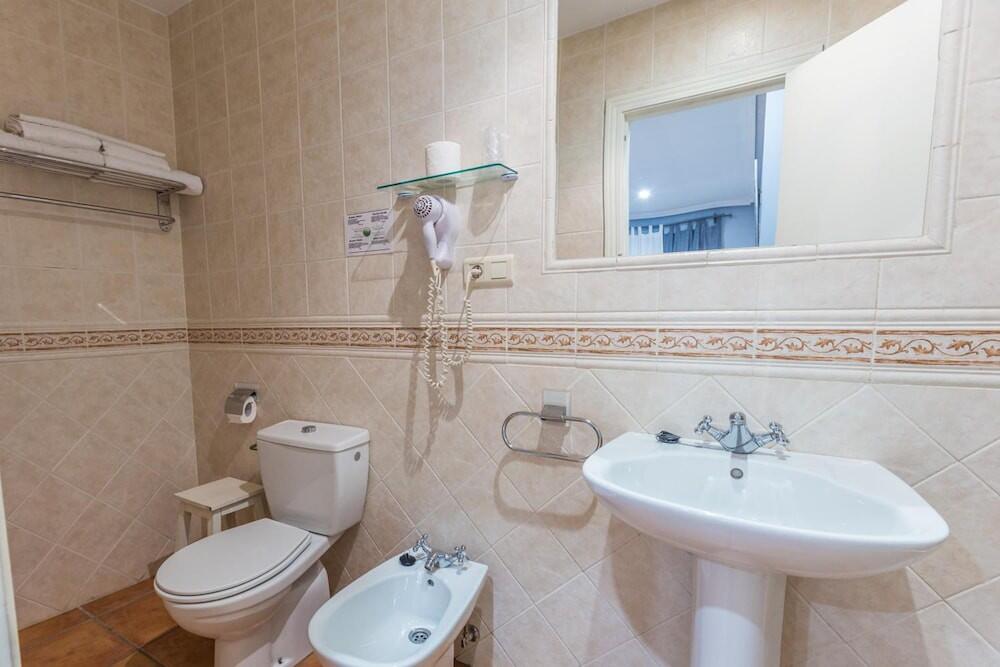 Foto del baño de Hotel La Encomienda