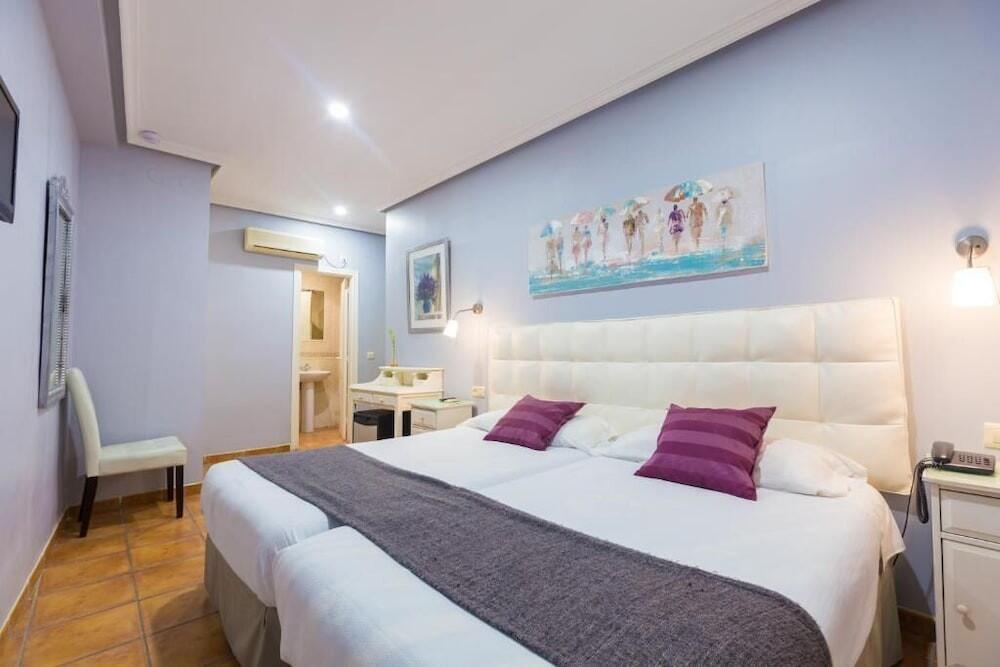 Foto de una habitación de Hotel La Encomienda