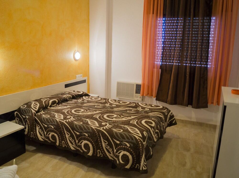 Foto de una habitación de Hotel Muñoz