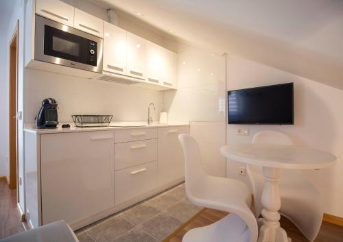 Foto de una habitación de Apartamentos San Justo Plaza