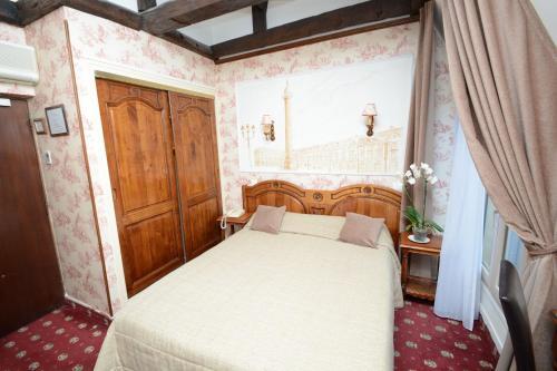 Foto de una habitación de Familia Hotel