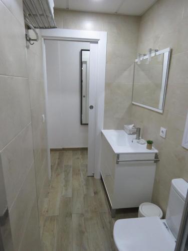 Foto del baño de Living Sevilla Apartments Hércules