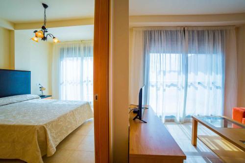 Foto de una habitación de Apartamentos Adaria Vera