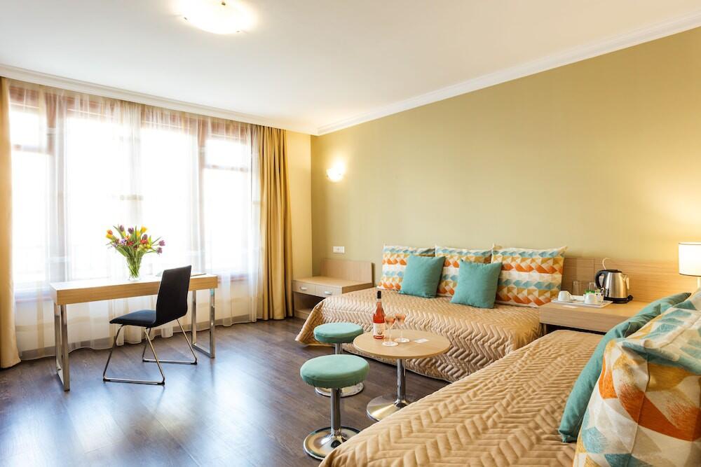 Foto de una habitación de Geneva Hotel