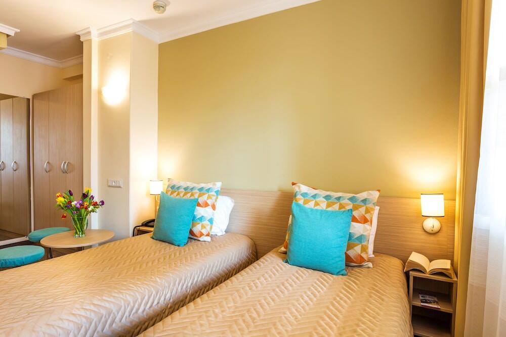Foto de una habitación de Geneva Hotel