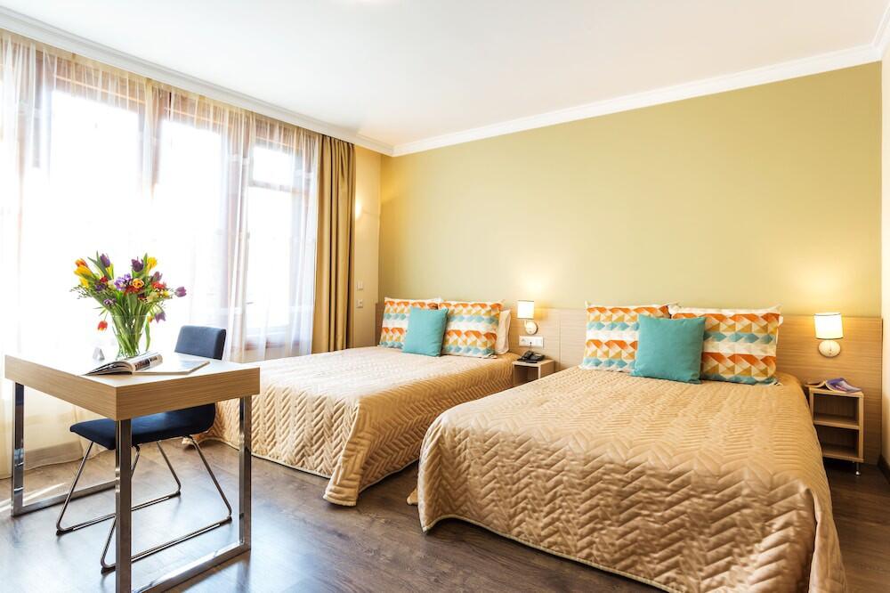 Foto de una habitación de Geneva Hotel