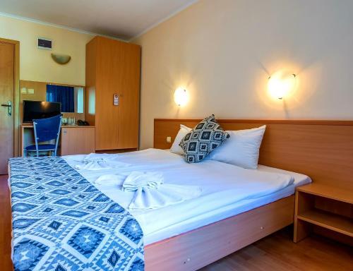 Foto de una habitación de Family Hotel Dalis