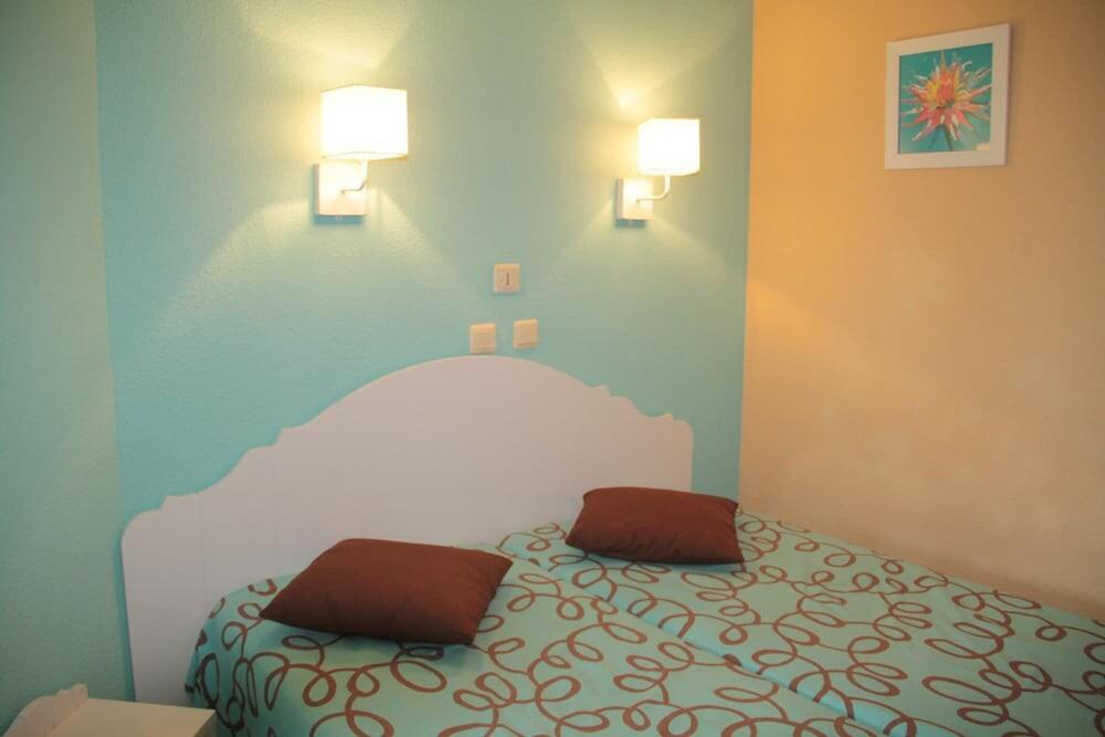 Foto de una habitación de Lagrange Grand Bleu Vacances – Résidence Les Jardins de Neptune