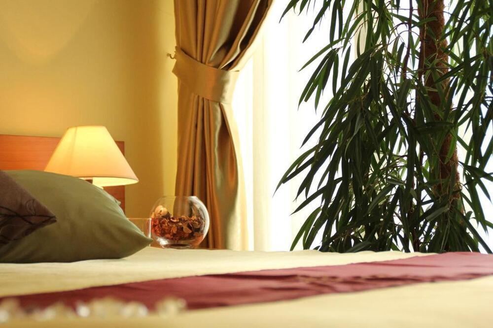 Foto de una habitación de Hotel Pula