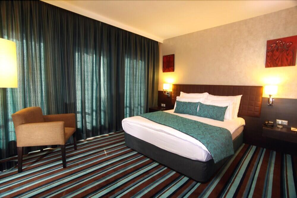 Foto de una habitación de Notte Hotel