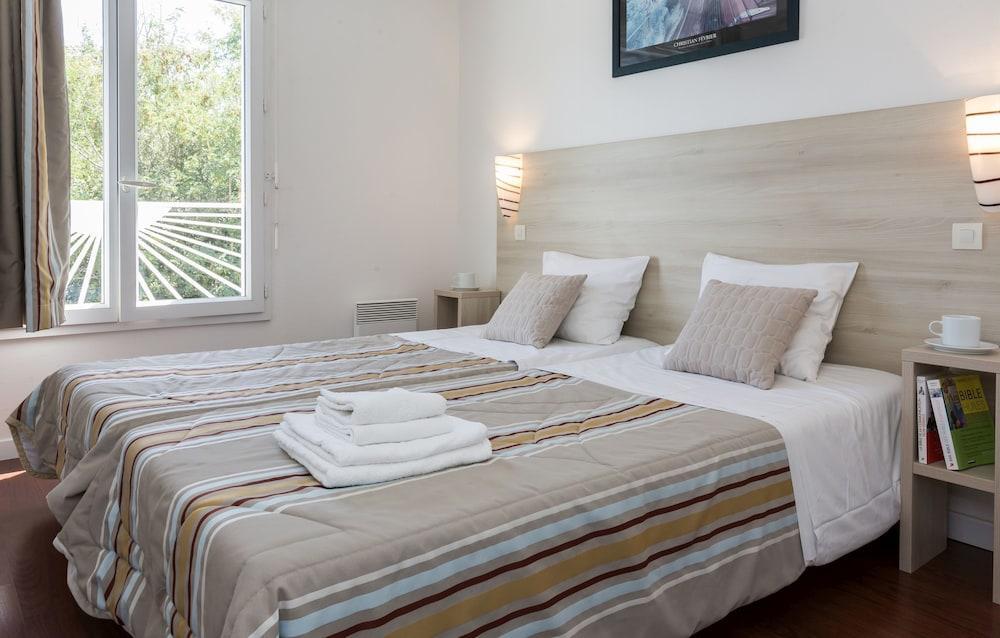 Foto de una habitación de Résidence Odalys Thalassa
