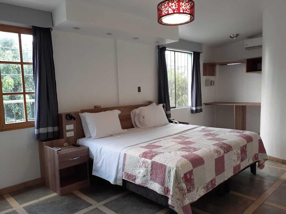 Foto de una habitación de Hotel Villa Jazmin