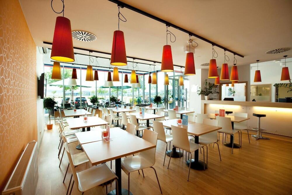 Foto de restauración de Motel Orange Wings Wiener Neustadt
