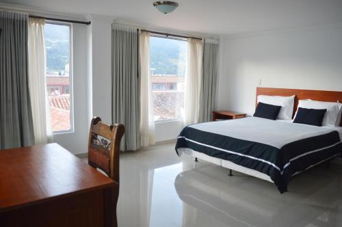 Foto de una habitación de Hotel Hontibon