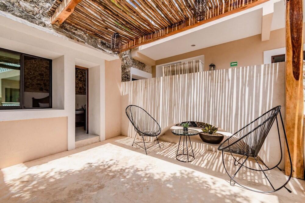 Foto de una habitación de Hotel Colonial Zaci by GuruHotel